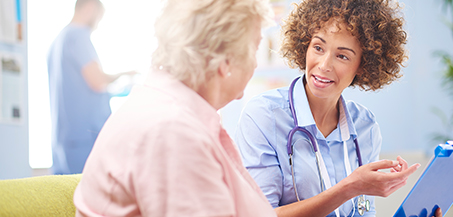 Doctor talking to a woman